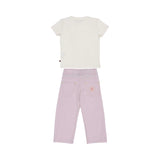 The back of an AIGNER Kids lilac trouser and cream t-shirt set, showing the rear pockets and the signature pink AIGNER logo patch on the trousers.