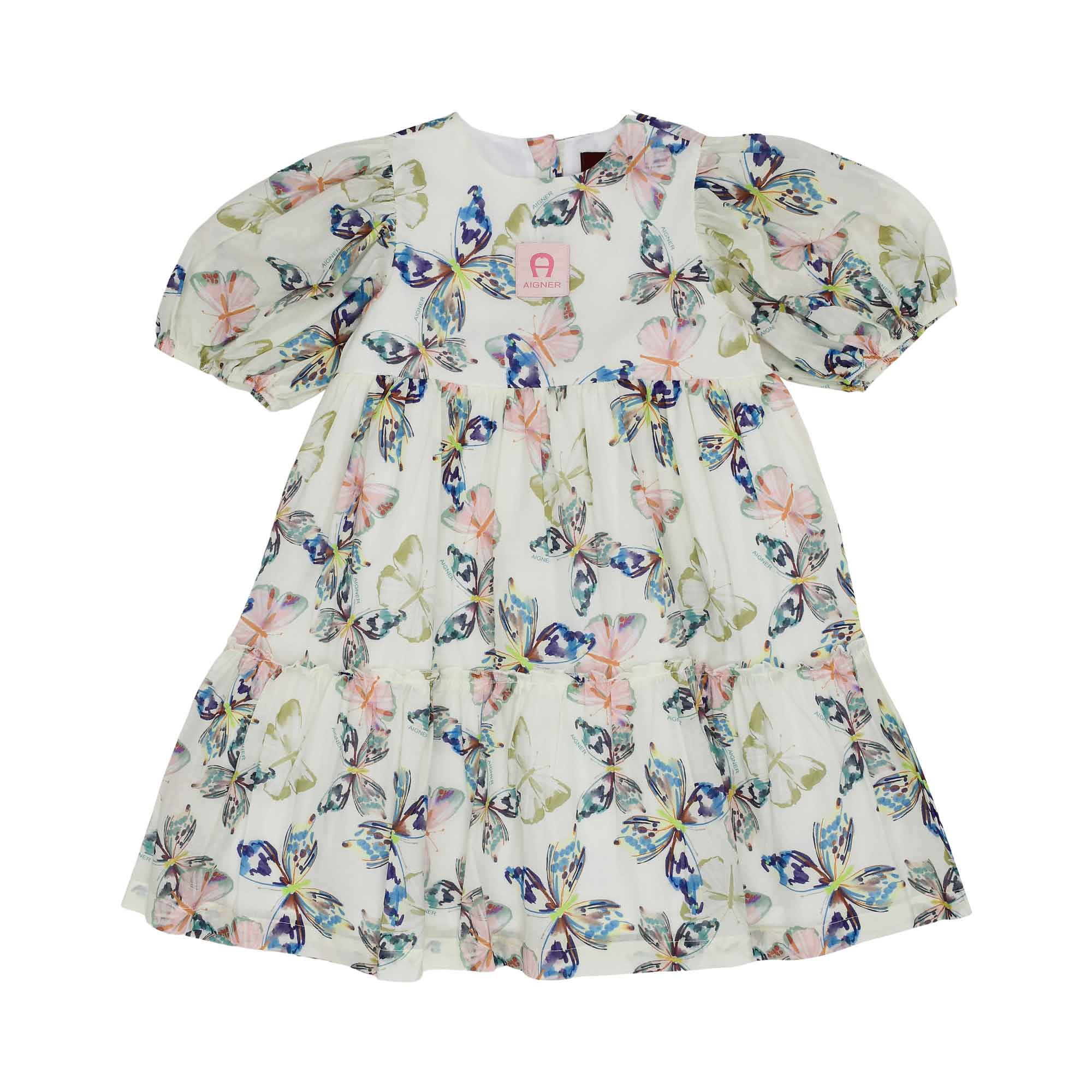 Front view of a white AIGNER Kids chiffon dress featuring a colorful butterfly print, puff sleeves, and a pink logo patch on the chest.