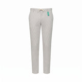Light grey pants with thin vertical stripes, a cream drawstring at the waist, belt loops, and side pockets. A green tag hangs