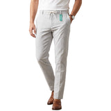 Light grey trousers with fine white vertical stripes, featuring a drawstring waist and side pockets.