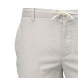 Light grey striped pants with belt loops and an off-white drawstring with white tips, tied in a bow.