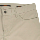 Light beige casual pants with a silver-toned button, belt loops, and a curved front pocket.