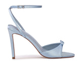 Outer side profile view of the BLACK SUEDE STUDIO Albie 100 light blue satin sandal showing the stiletto heel.