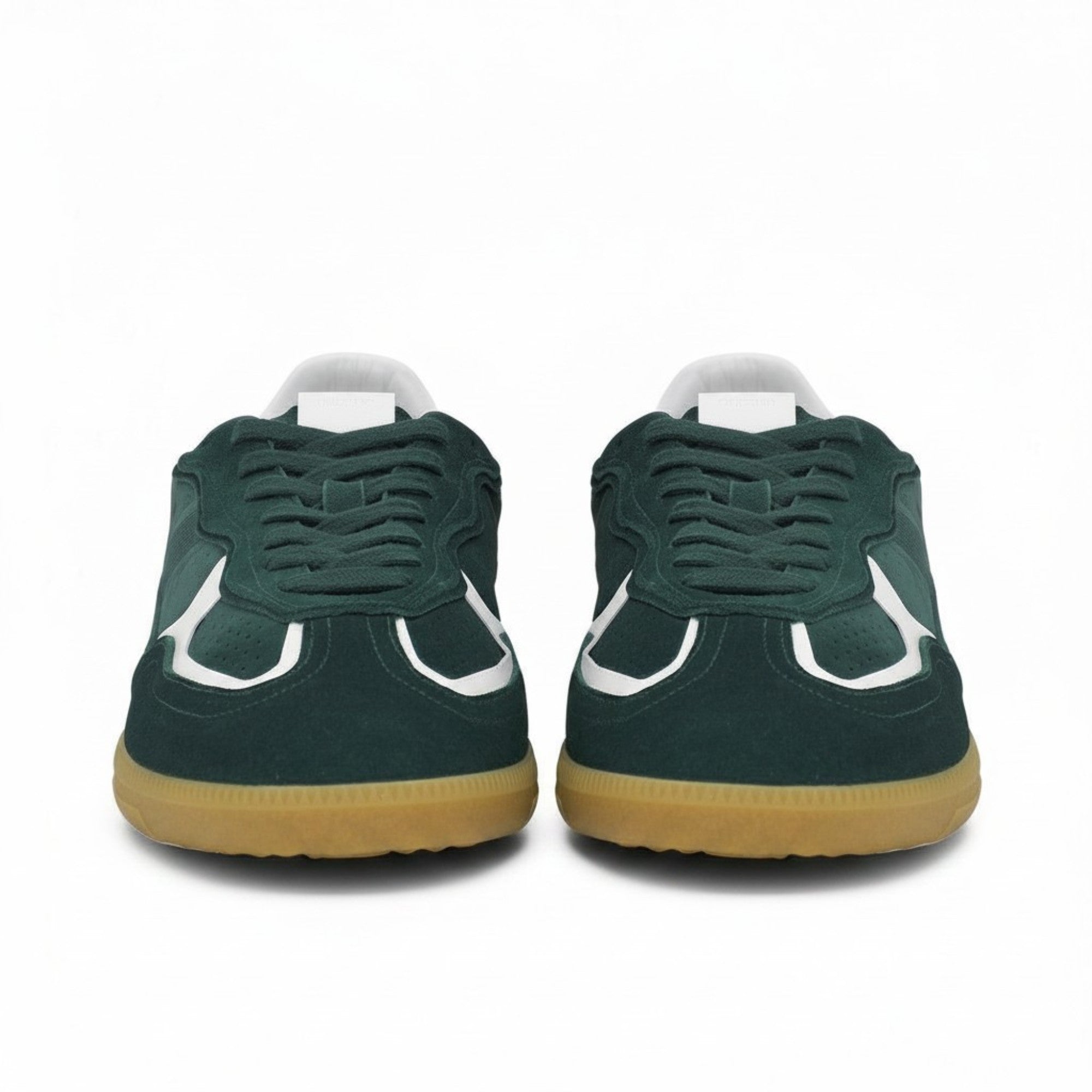 Front face-on view of a pair of ALOHAS forest green suede sneakers highlighting the lace-up closure and white leather curved details on the toe box.