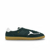 Side profile view of a single ALOHAS low-top sneaker in forest green suede with white leather accents, gold branding, and a gum rubber sole on a white background.
