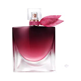 Lancome La Vie est Belle Elixir EDP bottle with deep red to clear gradient liquid, glittery pink neck band and sparkling pink