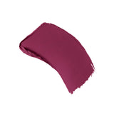 A thick swatch of matte berry blush with textured, uneven edges.