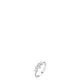 Silver-toned steel ring with three clear heart-shaped zircons, the largest in the centre, set on a slender band.