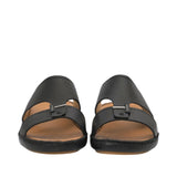 Front-facing view of a pair of Antonio black leather sandals, highlighting the grained texture, central tab with a gold-finish metal bar accent, and open-toe design against a white background.