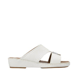 Profile view of an Antonio white grained leather Arabic sandal, showing its broad cross-strap upper design and matching leather-wrapped platform wedge sole against a white background.