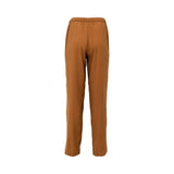 Rear view of AQUILLORA terracotta trousers showing the gathered elastic waistband and smooth fabric drape.