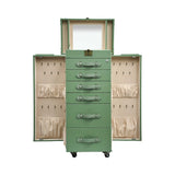 Angled view of the Artisan standing vanity trunk showing the depth of the drawers and the velvet-lined interior compartments.