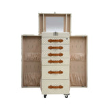 Angled view of the Artisan standing vanity trunk showing the depth of the drawers and the velvet-lined interior compartments.