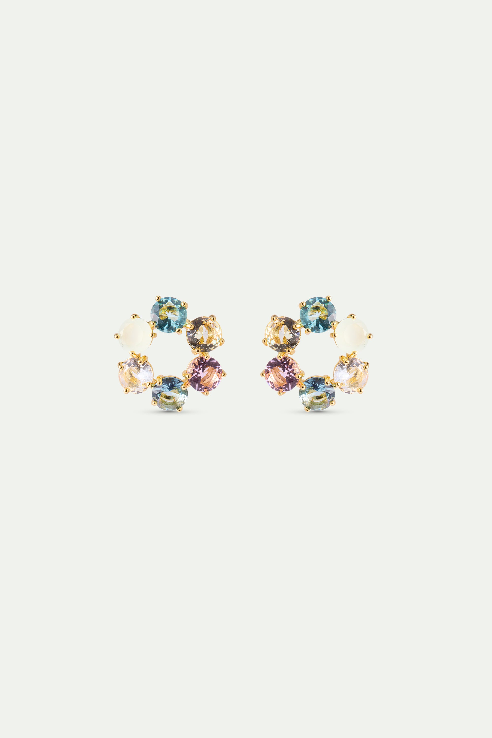 Pair of gold-toned C-shaped post earrings, each with six multicolored faceted gemstones and one opaque white stone.