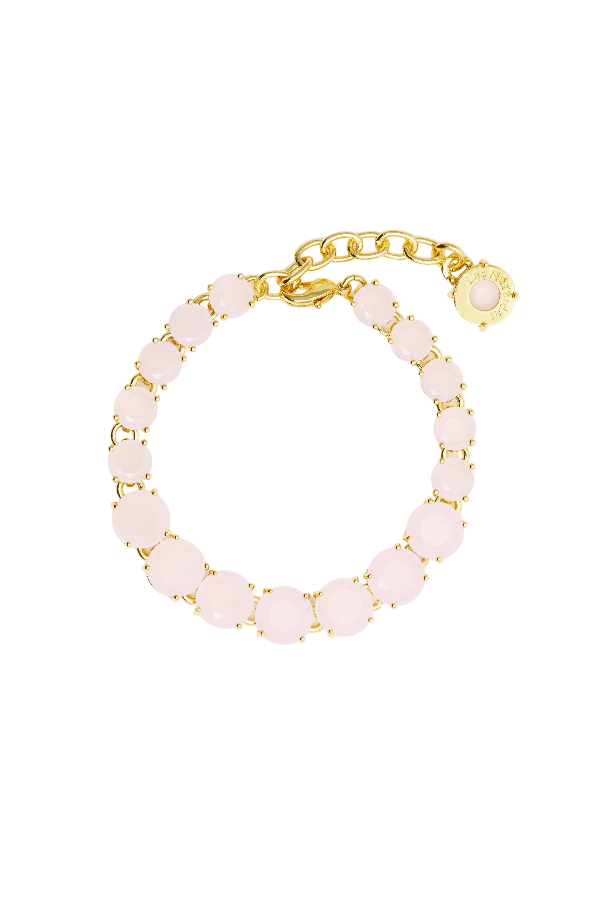 Pale pink faceted element bracelet with gold-toned settings and extension chain