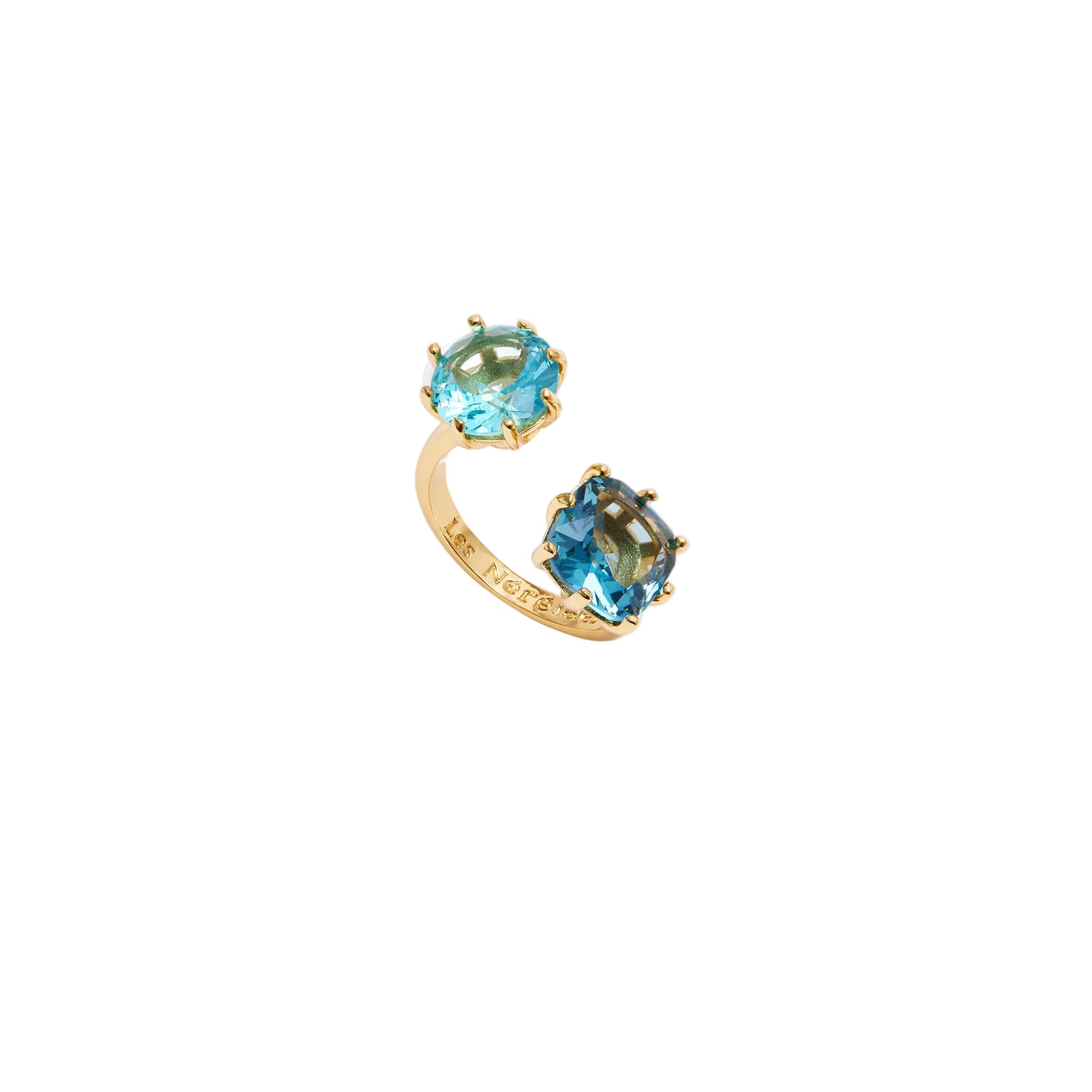 Gold-toned open-ended ring with one light blue faceted gemstone and one deep blue faceted gemstone, both in claw settings.