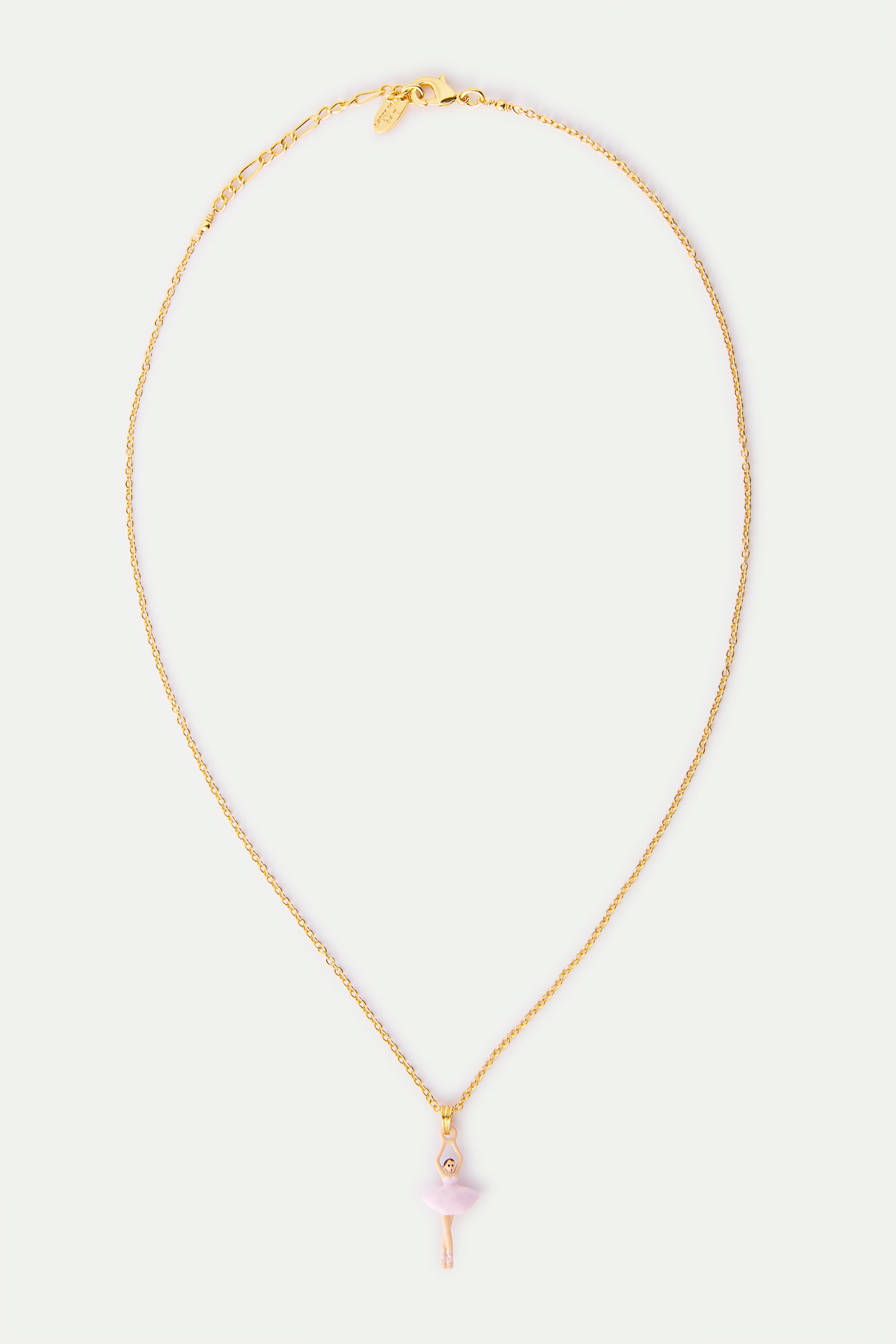 Gold-toned necklace with a pale pink ballerina pendant, featuring a fluffy pink tutu, clear gem head, and star charm.