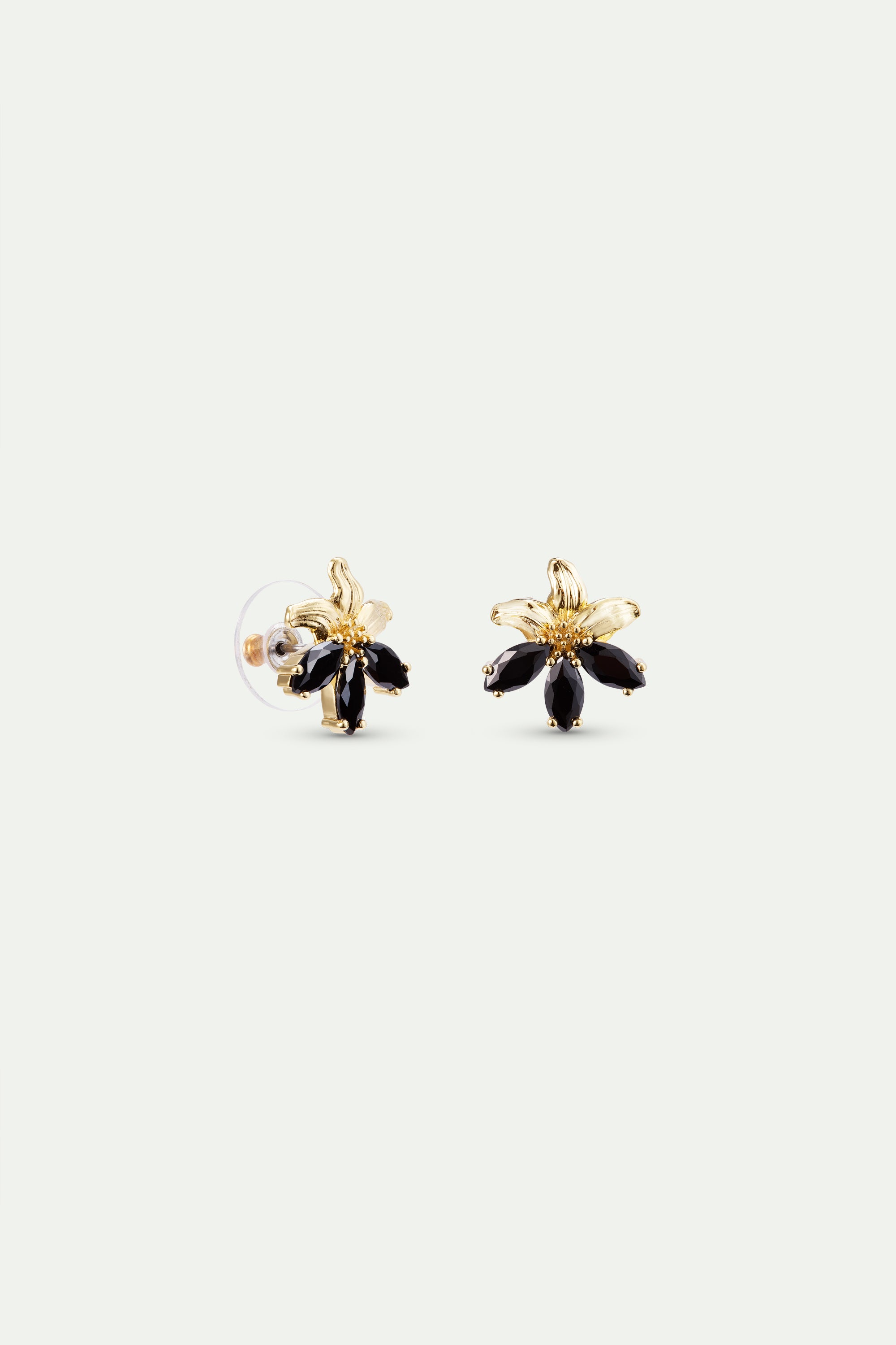 Pair of gold-toned floral post earrings, each featuring five black marquise-cut stones. One earring shows a clear butterfly b