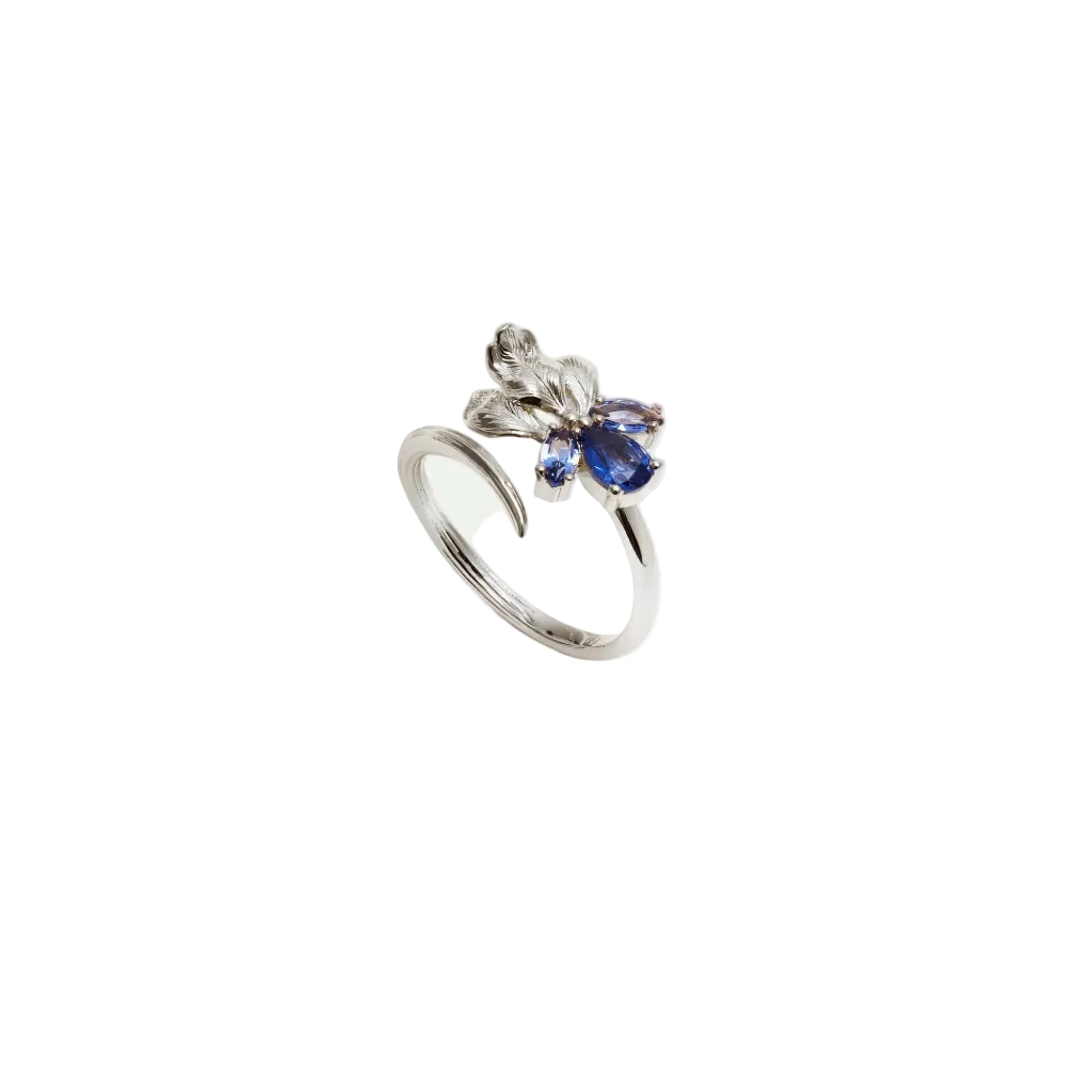 Silver-toned adjustable ring with a textured leaf design and three blue stones: one large pear-shaped, two small oval.