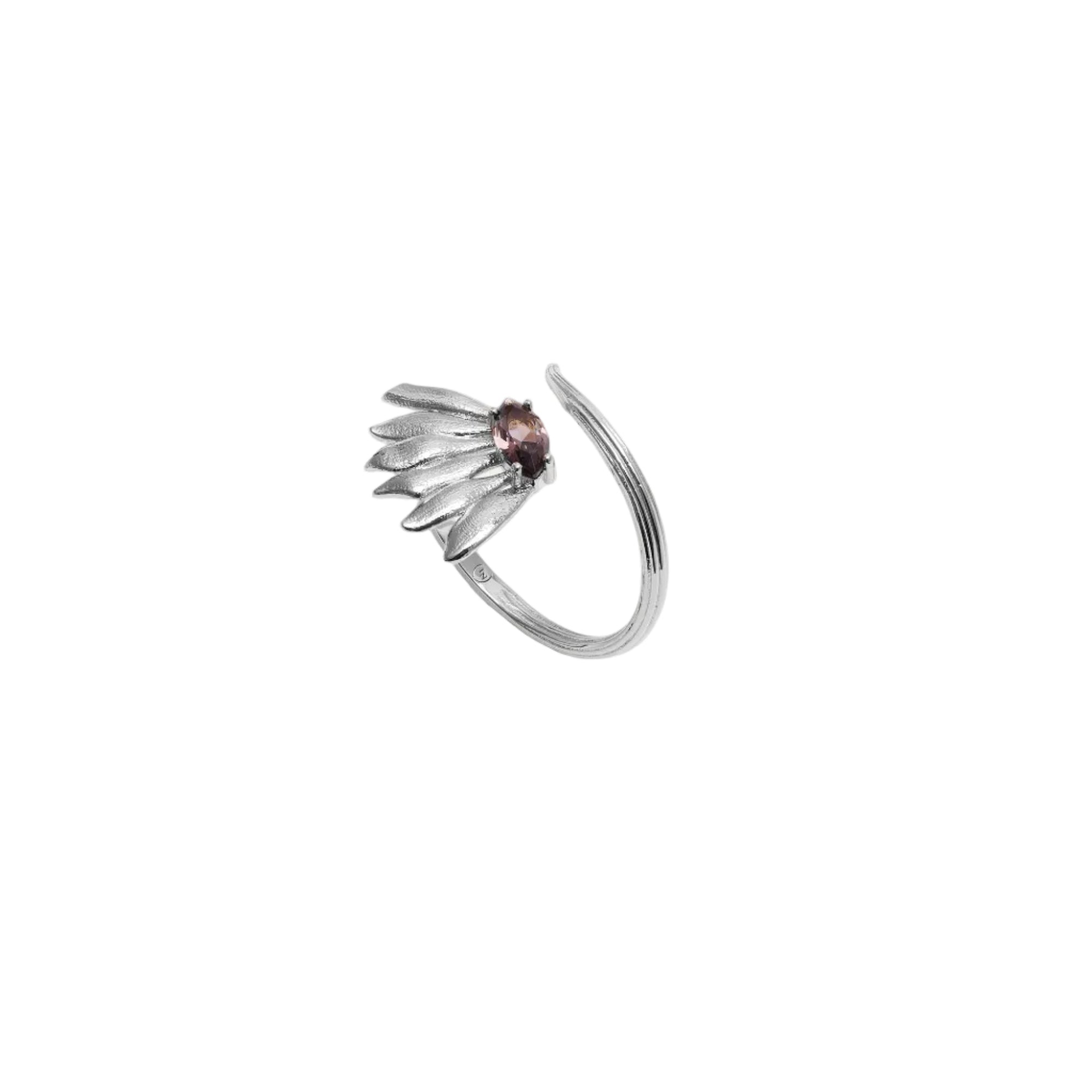 Silver-toned adjustable ring with fanned leaf-like elements, a central reddish-brown faceted stone, and a ridged band.