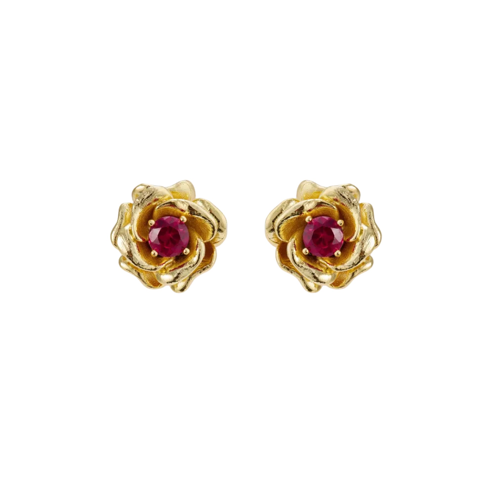 Pair of gold-toned rose stud earrings, each featuring a central round red faceted stone set in claws.