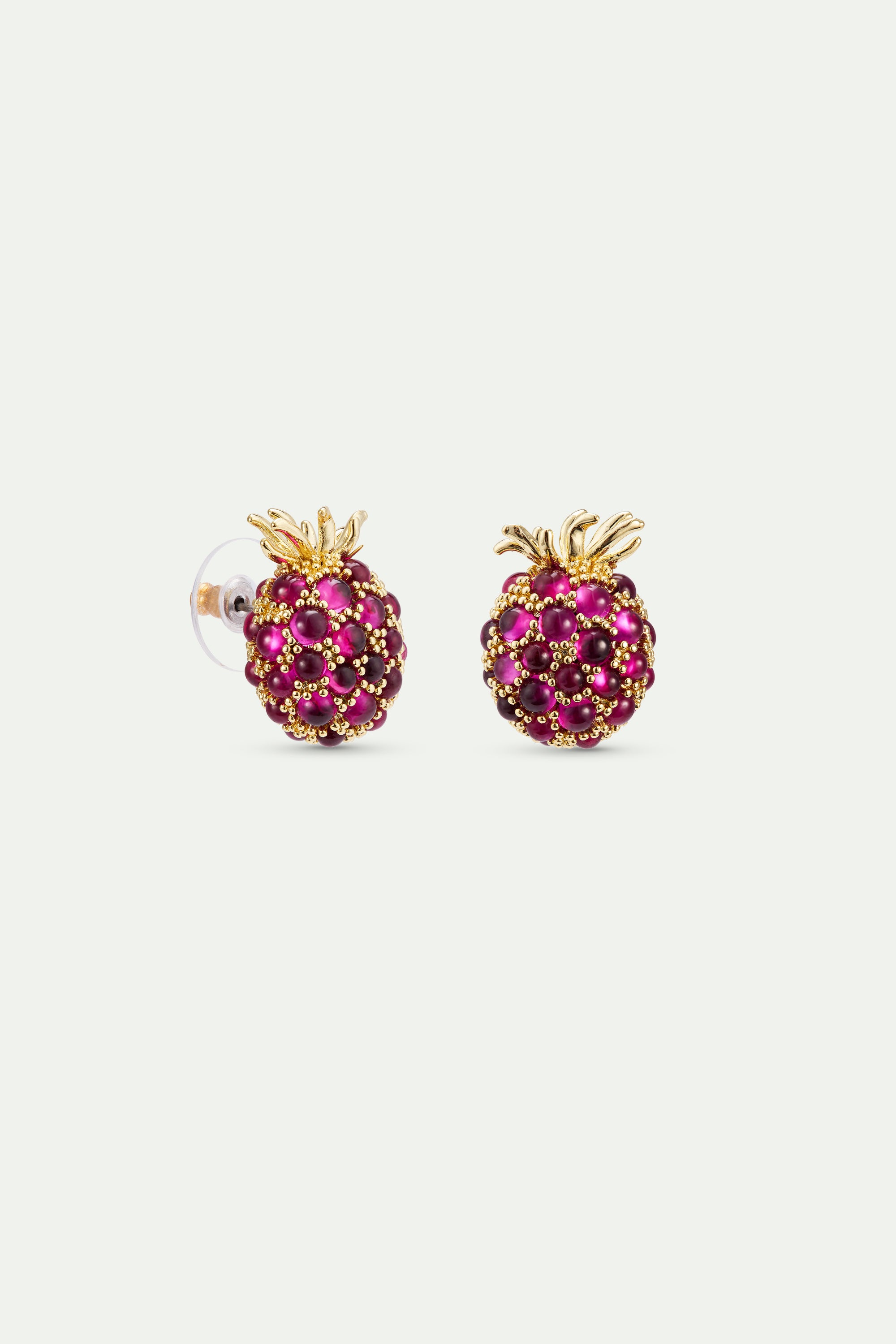 Pair of stud earrings shaped like raspberries, covered in magenta beads and tiny gold-toned spheres, with gold-toned leaf cro