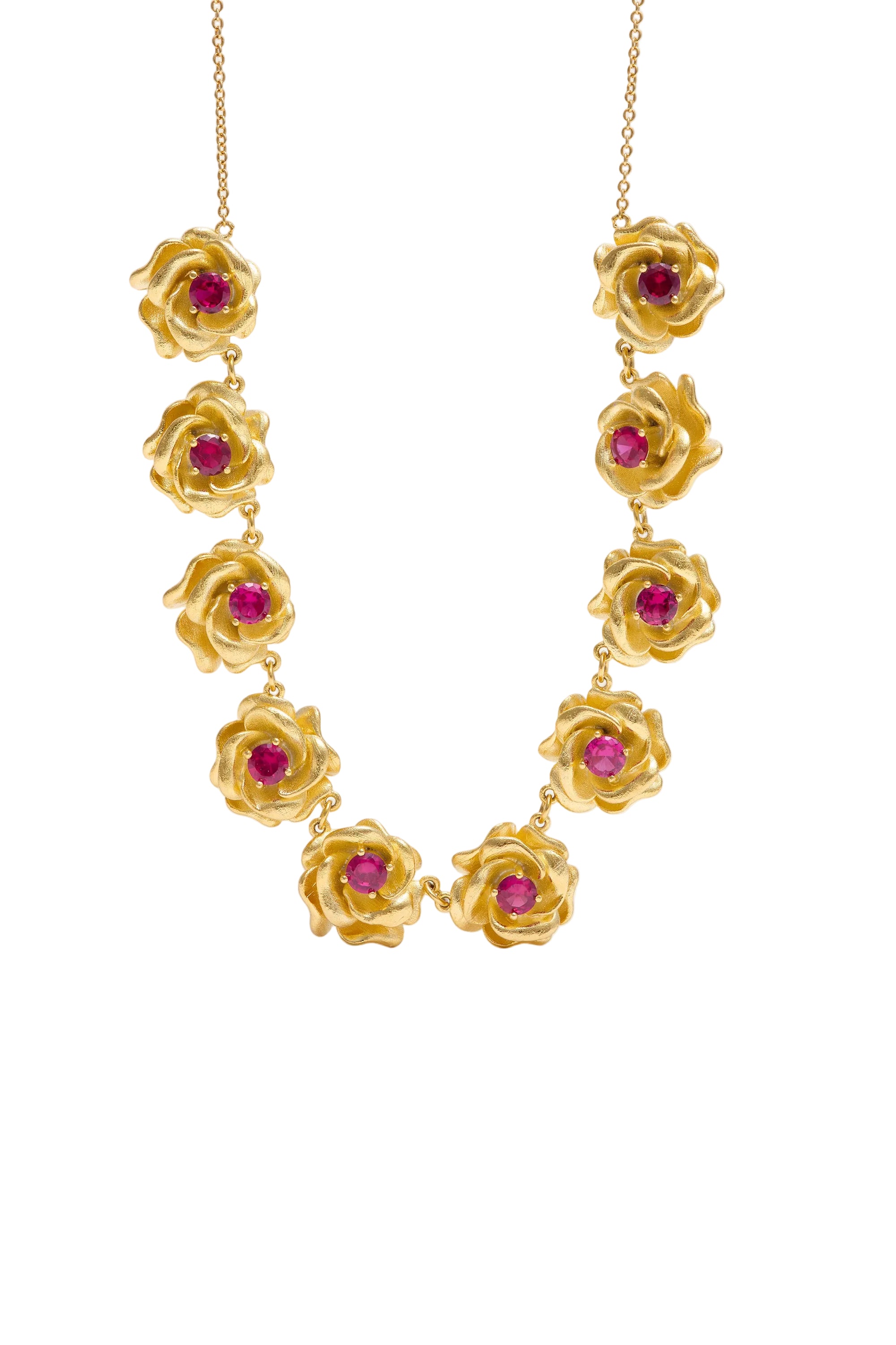 Gold-toned necklace with eleven textured rose-shaped elements, each featuring a central round red gemstone.