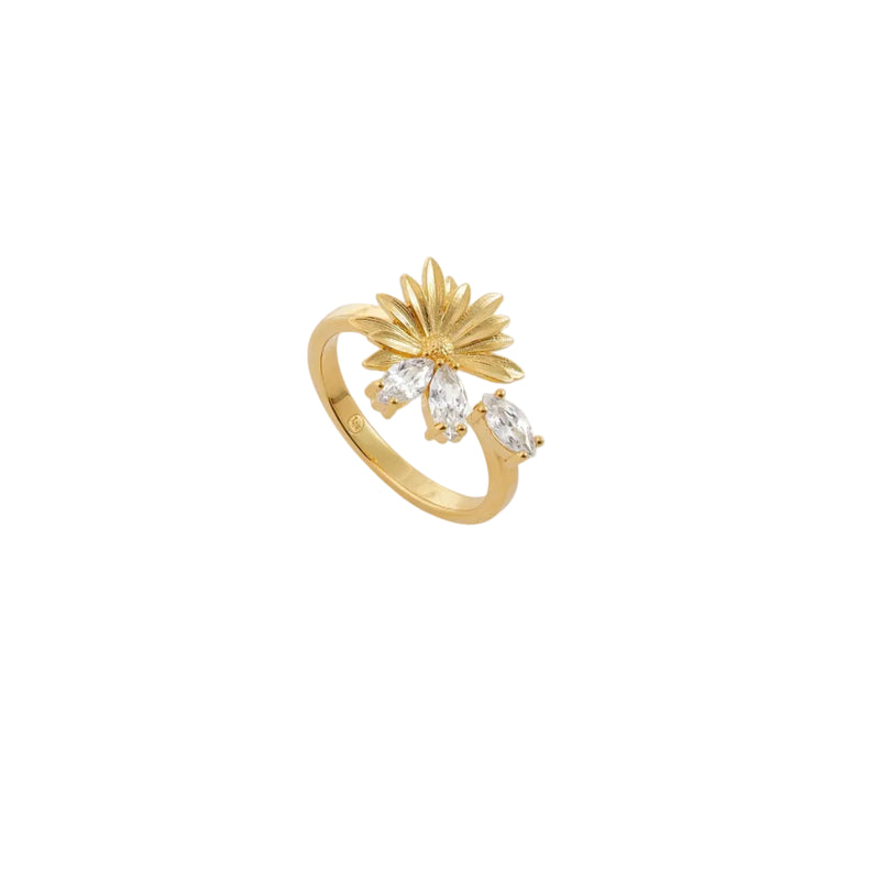 Gold-toned adjustable ring with a textured floral design and three clear marquise-cut faceted stones.