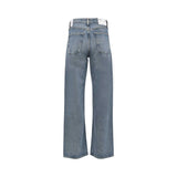 Back studio shot of the blue Agolde jeans showcasing the high-rise fit, classic patch pockets, and white brand label.