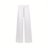 Front studio shot of white Agolde wide-leg jeans highlighting the signature asymmetrical criss-cross crossover waistband.