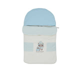 Front view of a blue Aigner Kids baby nest featuring a winter bear family print, beige geometric patterns, and a rounded hood.