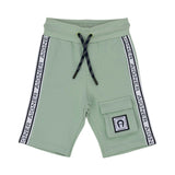 A detailed close-up of the forest green shorts showing the textured cotton fabric. It highlights the dark green and white braided drawstring and the signature Aigner horseshoe logo patch in white and green.