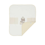 Aigner Kids cream baby blanket folded at the corner to show the soft double-layer fabric and manufacturer's care tag.