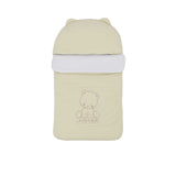 Front view of a cream Aigner Kids baby nest featuring an embroidered teddy bear, Aigner logo, and a hood with small rounded ears.