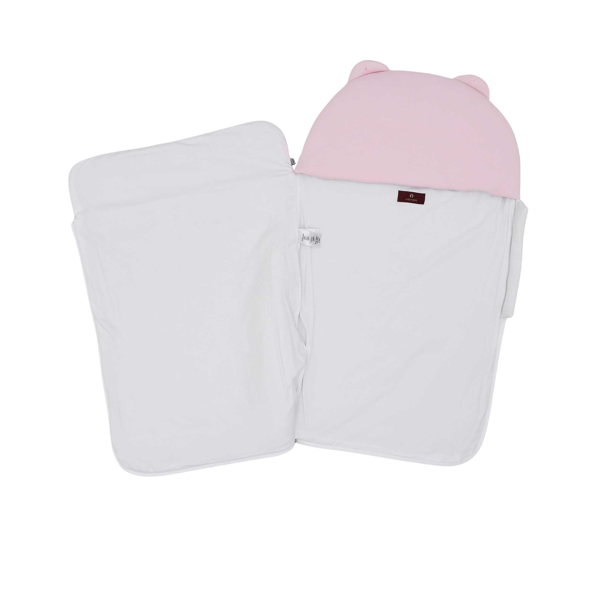 The Aigner Kids baby nest unzipped and open, showing the clean white interior lining and internal branding label.