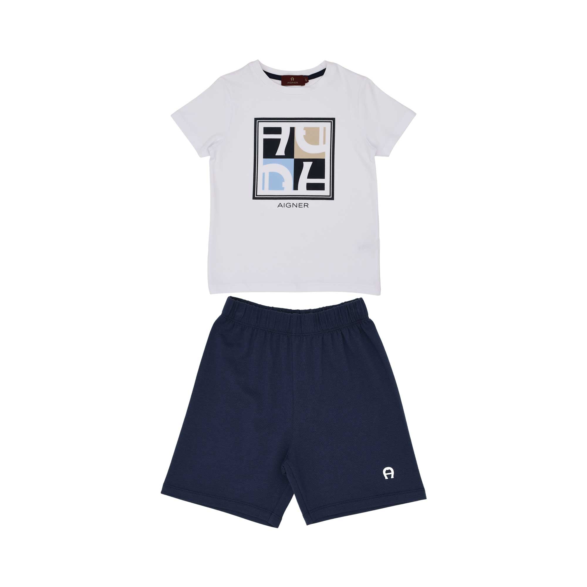 Full front view of the Aigner Kids two-piece set featuring a white short-sleeved T-shirt with a square logo graphic and navy blue jersey shorts.