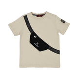 A beige boys' T-shirt by Aigner Kids featuring a diagonal black strap print and a 3D-effect black pouch with a zipper, resembling a crossbody bag. A small logo patch is visible on the left sleeve.