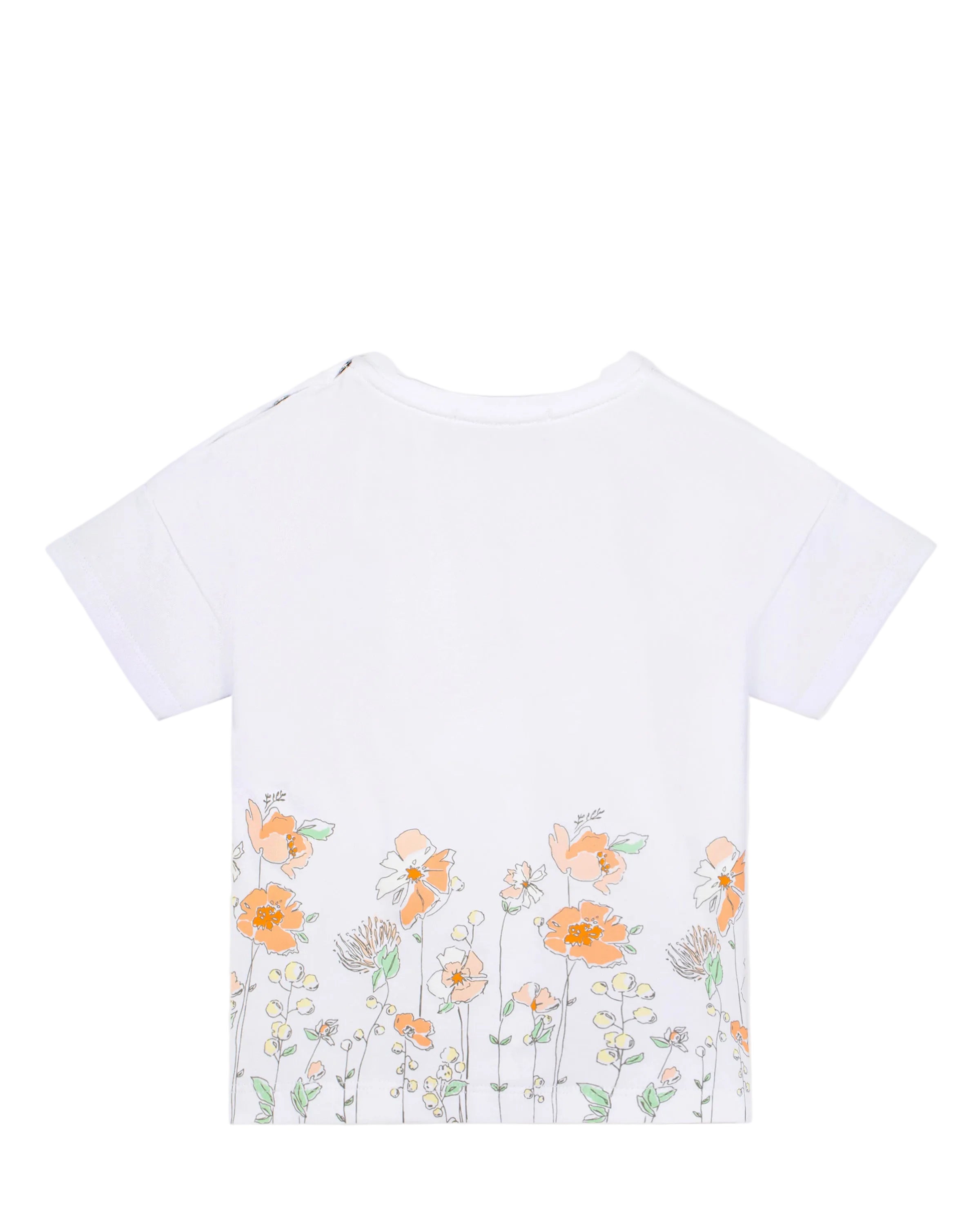 Back view studio flat-lay view of the Aigner Kids girls white cotton T-shirt, highlighting the comfortable short sleeves and the vibrant orange, peach, and mint green wildflower garden border illustration.