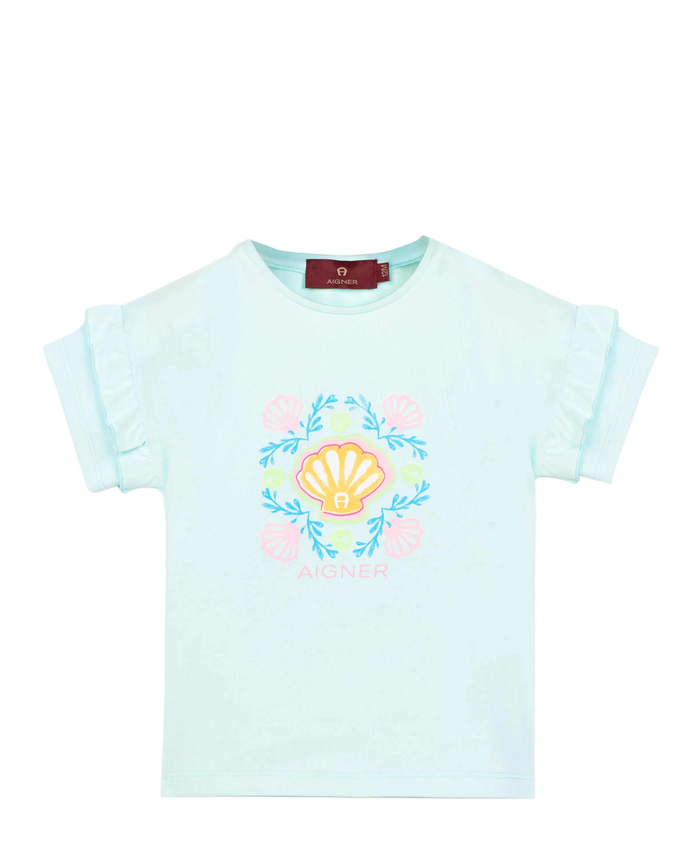 Front view flat-lay studio shot of the Aigner Kids girls blue cotton T-shirt, highlighting its decorative double ruffle sleeves and the colorful pink, blue, and yellow seashell logo graphic.