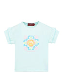 Front view flat-lay studio shot of the Aigner Kids girls blue cotton T-shirt, highlighting its decorative double ruffle sleeves and the colorful pink, blue, and yellow seashell logo graphic.