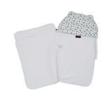 Interior view of the unzipped Aigner Kids baby nest, displaying the clean white cotton lining and the burgundy brand label at the top.