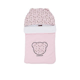 Front view of a pink Aigner Kids baby nest showing a bear-shaped applique with a wagon print, matching printed hood with 3D ears, and the Aigner brand name.