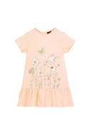 A pink Aigner Kids dress featuring a delicate floral and butterfly botanical print on the front and a ruffled hem.