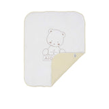 Aigner Kids pink baby blanket folded at the corner to show double-layered cotton fabric and the interior designer label.