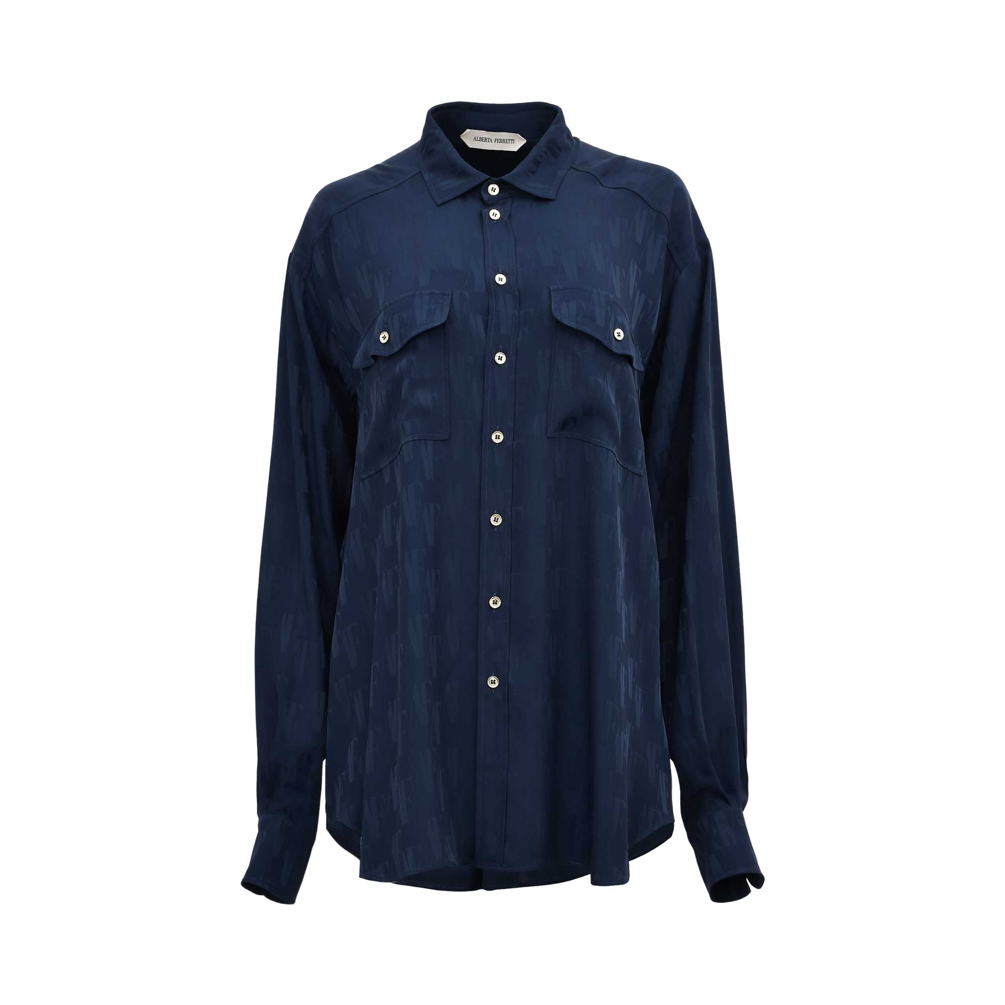 Front view of a navy blue long-sleeve silk shirt featuring an all-over tonal monogram pattern and a clean concealed button-down front.