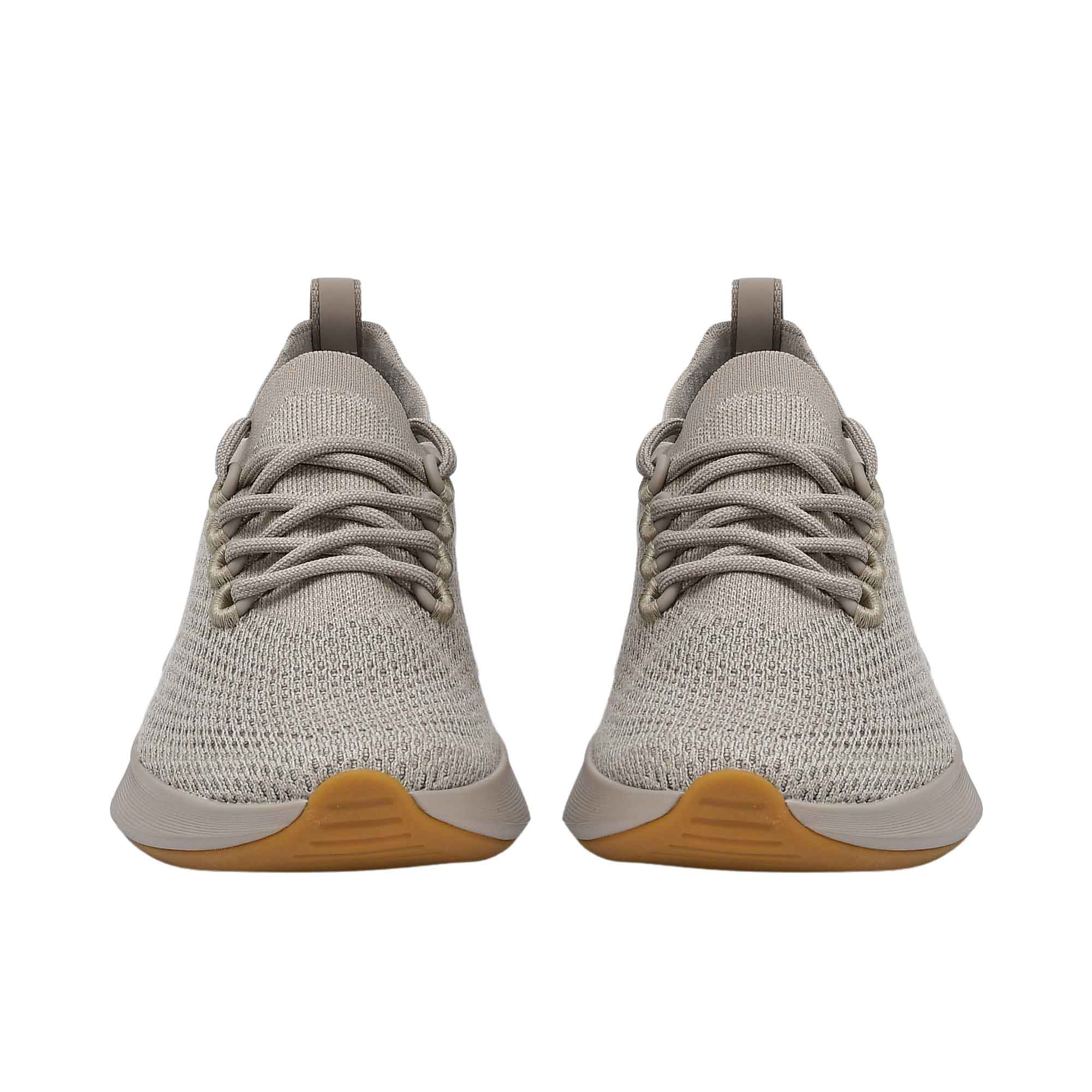Front-facing view of a pair of Allbirds Tree Dasher 2 shoes, displaying the textured light grey toe boxes and matching laces.