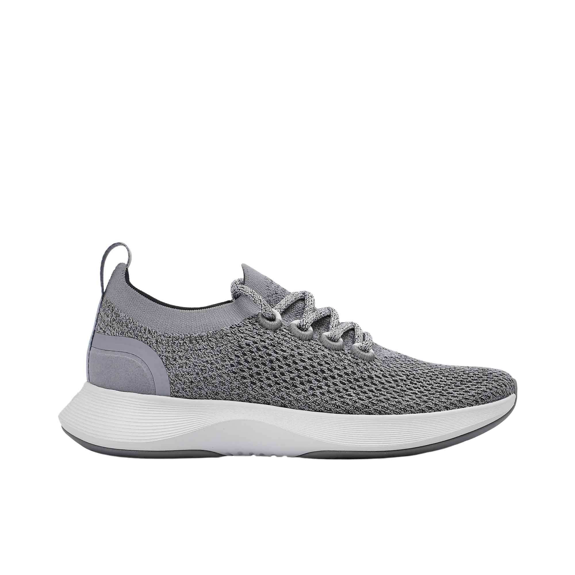 Profile view of a single Allbirds Tree Dasher 2 sneaker, showcasing its medium grey knit upper, matching grey laces, and thick white midsole.