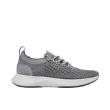 Profile view of a single Allbirds Tree Dasher 2 sneaker, showcasing its medium grey knit upper, matching grey laces, and thick white midsole.
