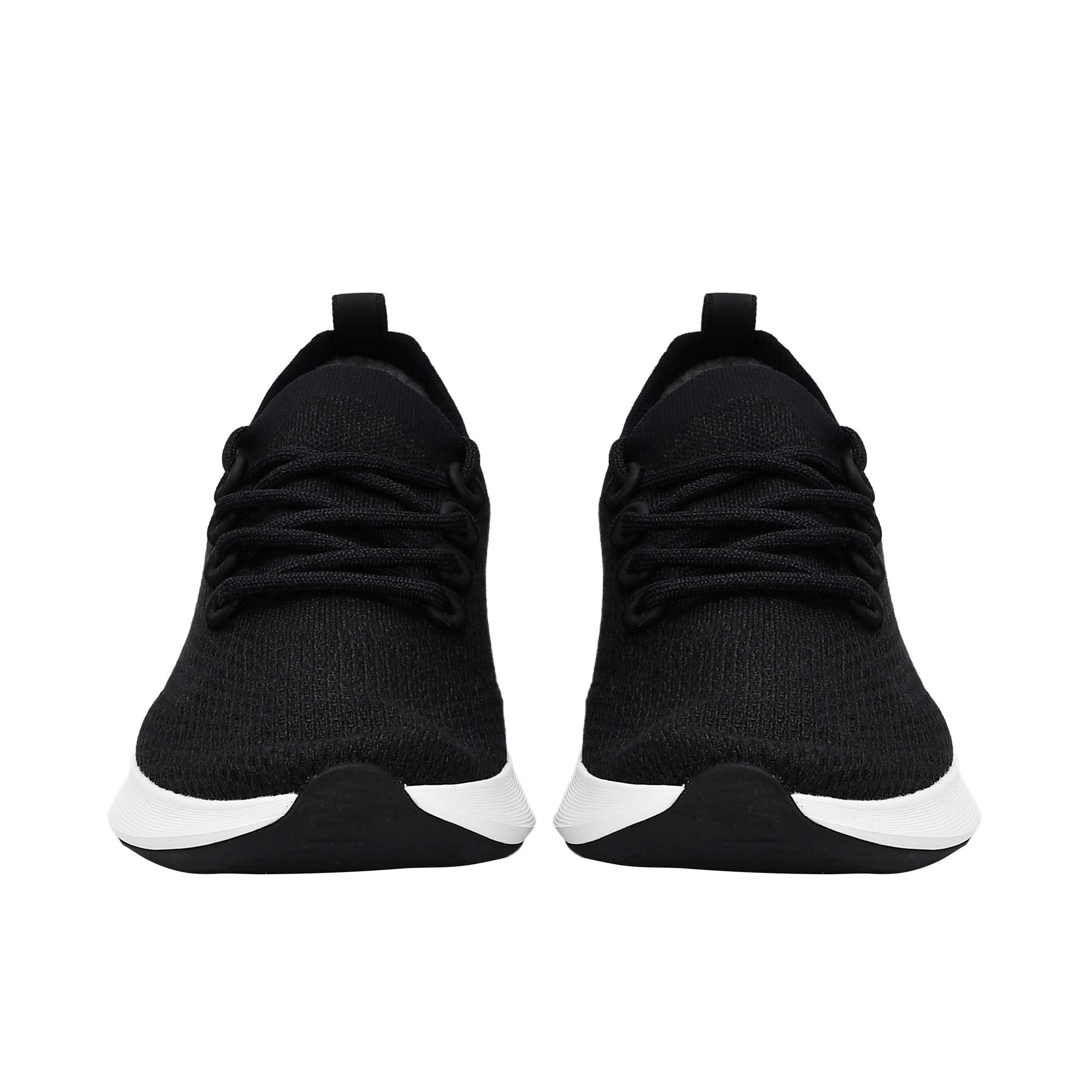 Front-facing view of a pair of black Allbirds Tree Runner sneakers, highlighting the symmetric lace-up design, rounded toe boxes, and contrasting white soles.