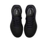 Directly overhead top-down view of a pair of black Allbirds Tree Runner sneakers, highlighting the gray insoles with the printed cursive "allbirds" logo.